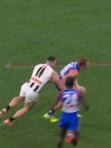 AFL World Erupts Over Controversial Umpiring in Tense Friday Night Thriller!